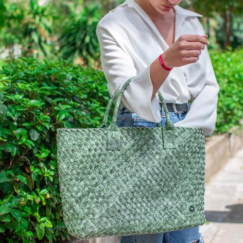 Green snake print braided shoulder bag, eco leather with enamel evil eye. Dimensions 52x32cm.