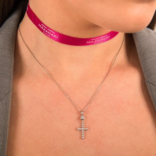 Sterling silver necklace, cross with white cubic zirconia and solitaire.