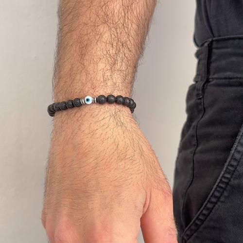 Men΄s silicone bracelet, black semi precious stones and evil eye.