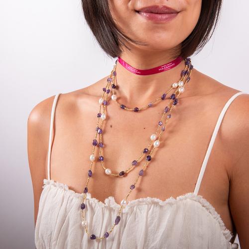 Cord necklace with gold aimatite, pearls and amethyst.
