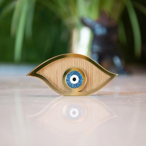 Lucky charm, plexiglass and wooden evil eye. Dimensions 17x8cm.