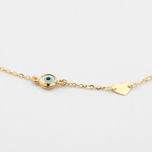 9K Yellow gold bracelet, heart and evil eye.