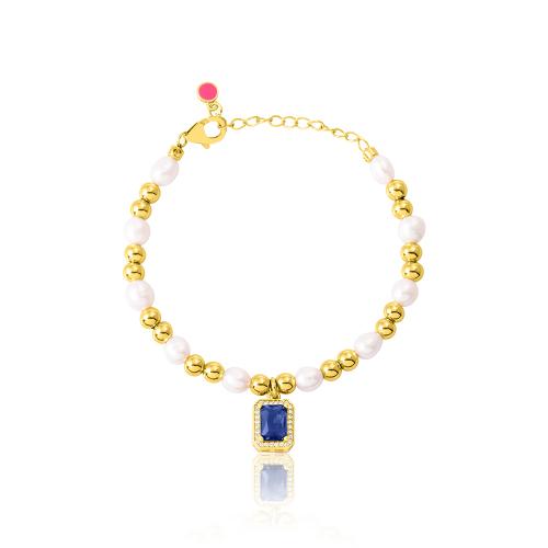 24Κ Yellow gold plated brass bracelet, blue solitaire with white cubic zirconia and pearls.