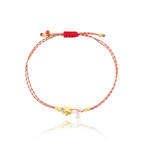 Red and white macrame Martis bracelet, yellow gold plated alloy, clover and solitaire.