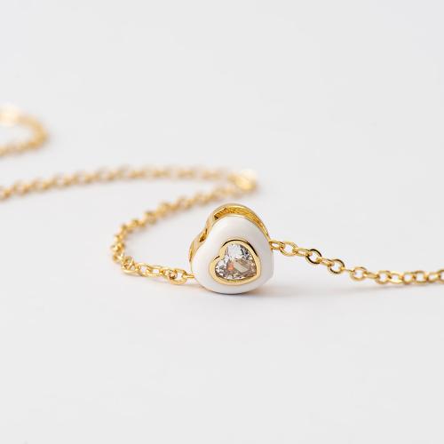 24Κ Yellow gold plated brass triple necklace, white enamel heart and solitaire.