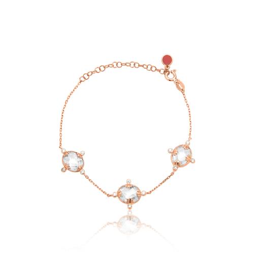 Rose gold plated sterling silver bracelet, white solitaires.