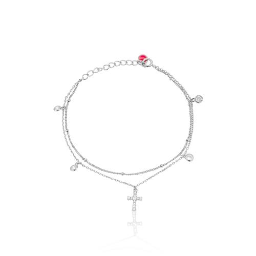 Sterling silver bracelet, cubic zirconia cross and solitaires.