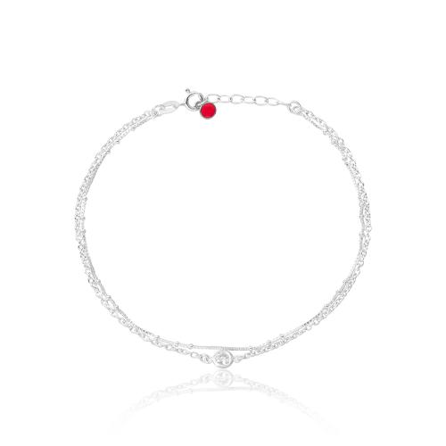 Sterling silver anklet, balls and solitaire.
