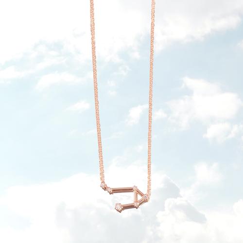 Zodiac constellation of Libra, rose gold plated sterling silver necklace with white cubic zirconia.