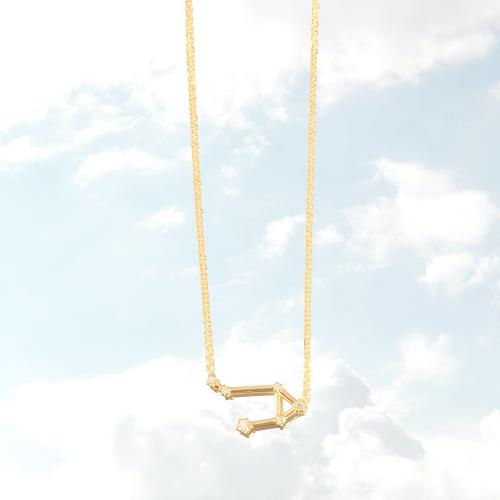 Zodiac constellation of Libra, yellow gold plated sterling silver necklace with white cubic zirconia.