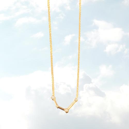 Zodiac constellation of Aquarius, yellow gold plated sterling silver necklace with white cubic zirconia.