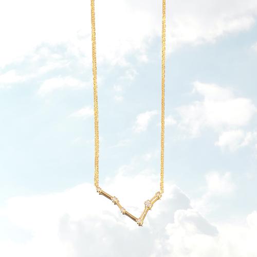 Zodiac constellation of Pisces, yellow gold plated sterling silver necklace with white cubic zirconia.