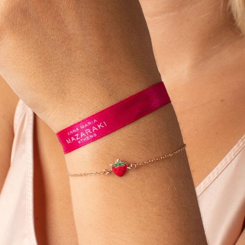 Rose gold plated sterling silver children"s bracelet, red enamel strawberry.